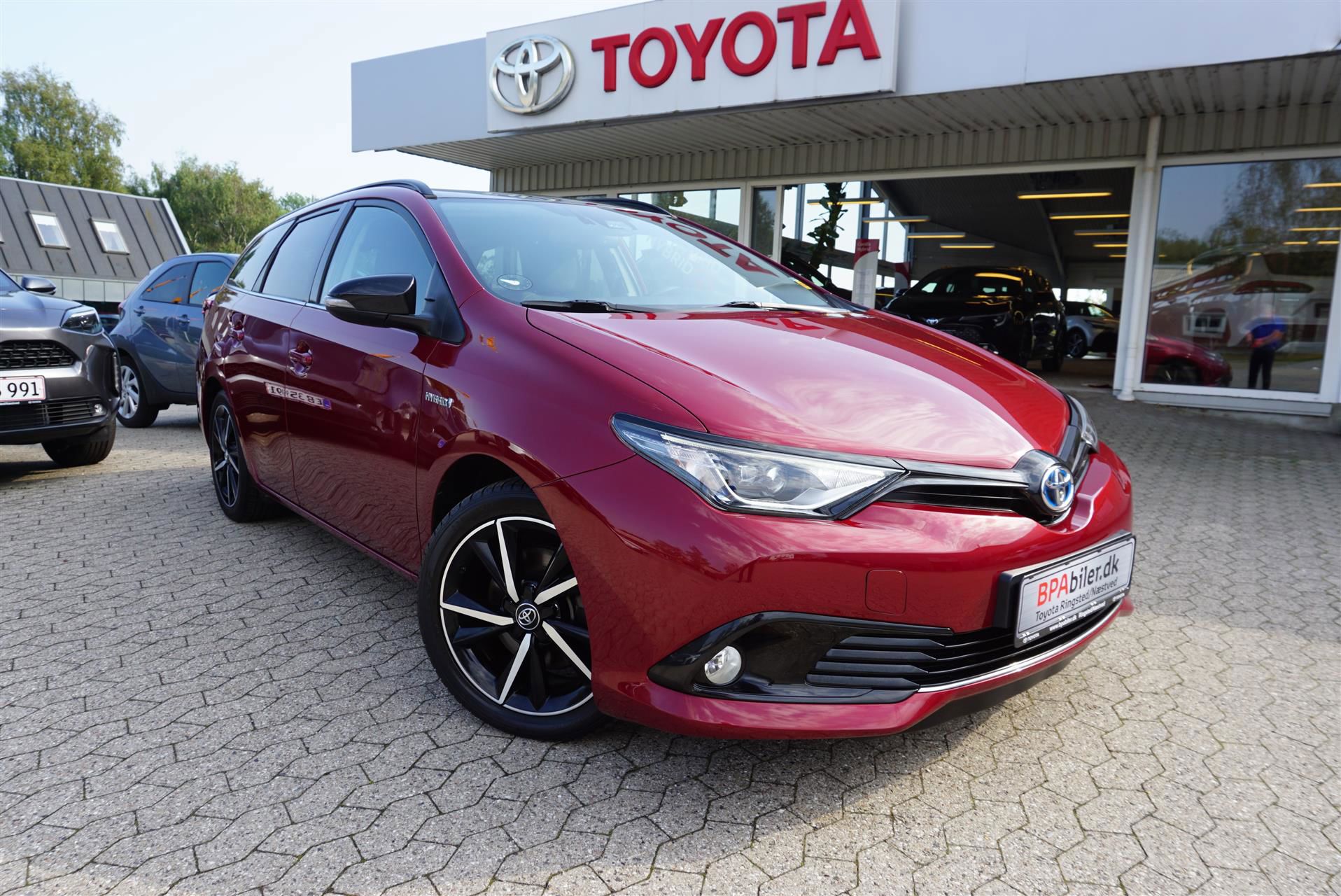 Billede af Toyota Auris Touring Sports 1,8 Hybrid Selected Bi-tone 136HK Stc Aut.