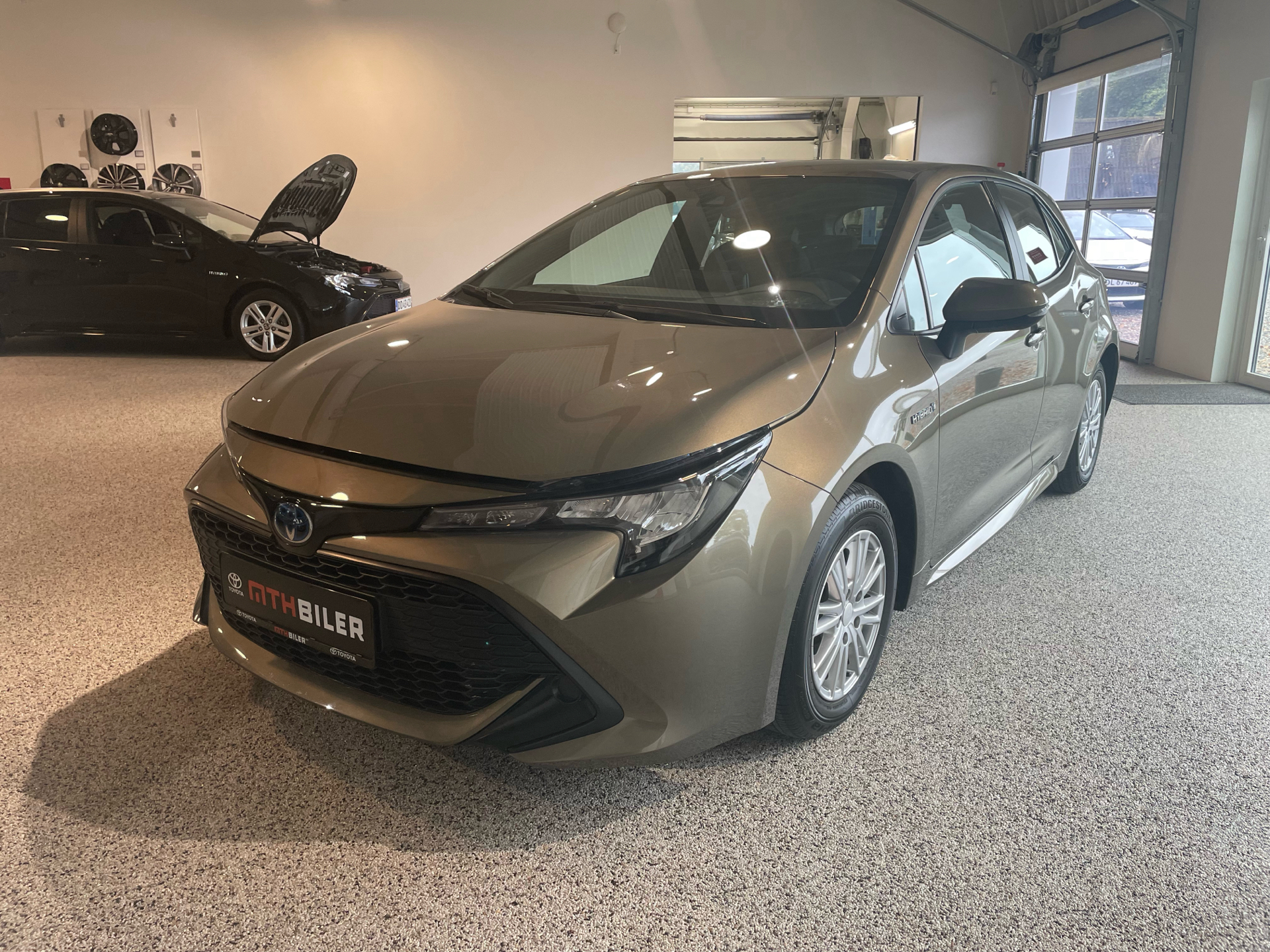 Billede af Toyota Corolla 1,8 Hybrid Essential E-CVT 122HK 5d Trinl. Gear