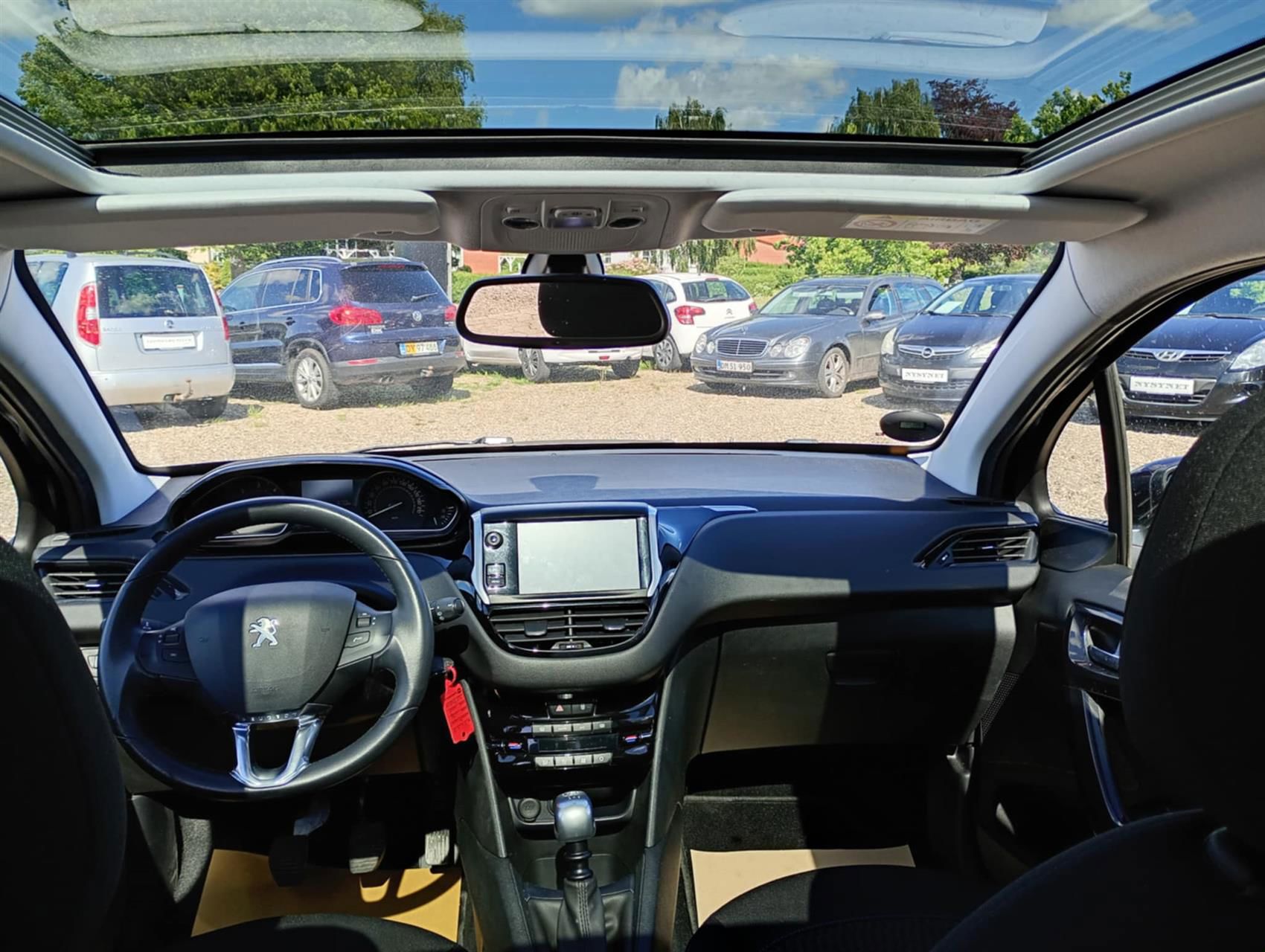 Billede af Peugeot 208 1,5 BlueHDi Signature Sky 100HK 5d