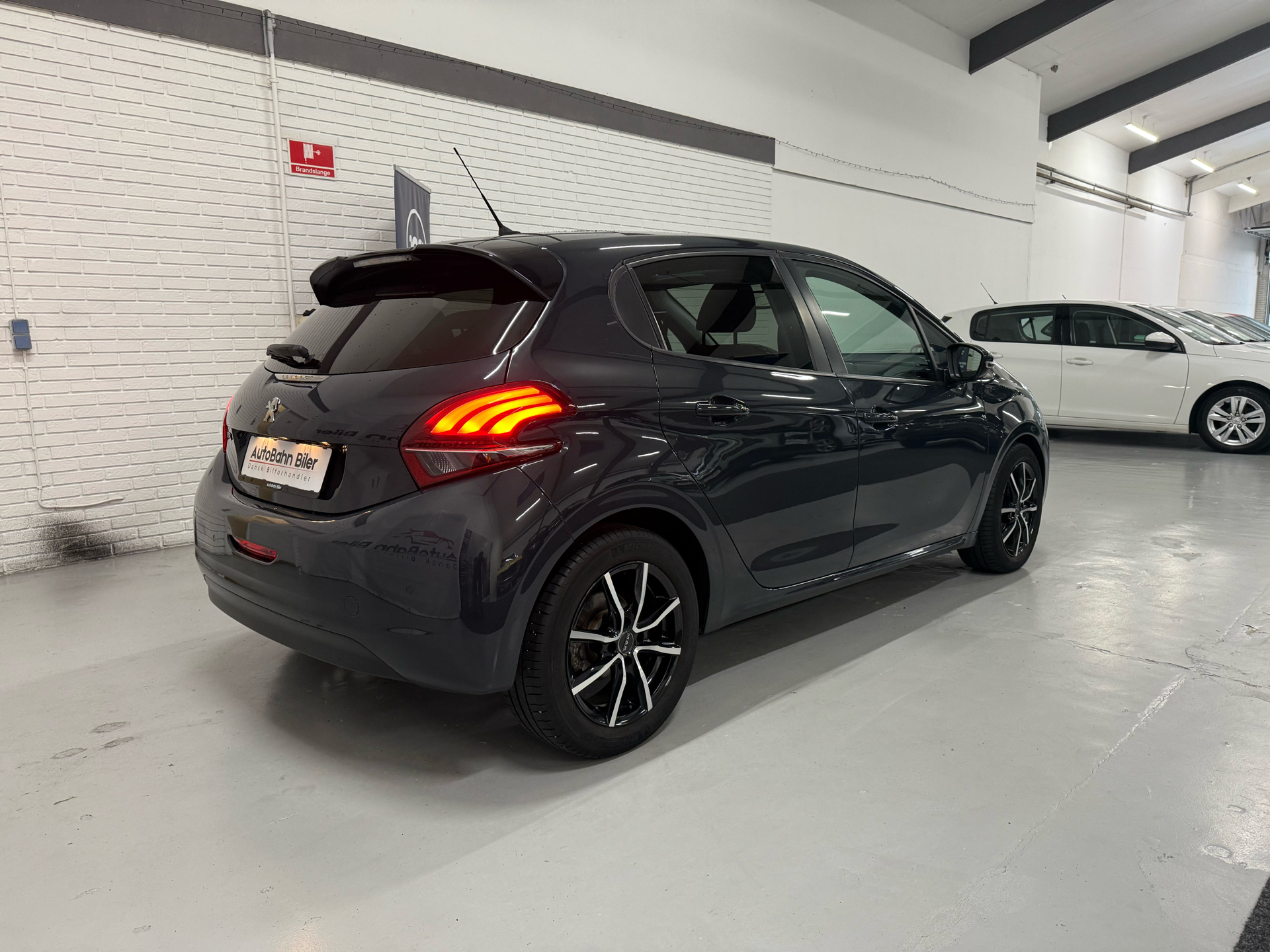 Billede af Peugeot 208 1,5 BlueHDi Signature Sky 100HK 5d