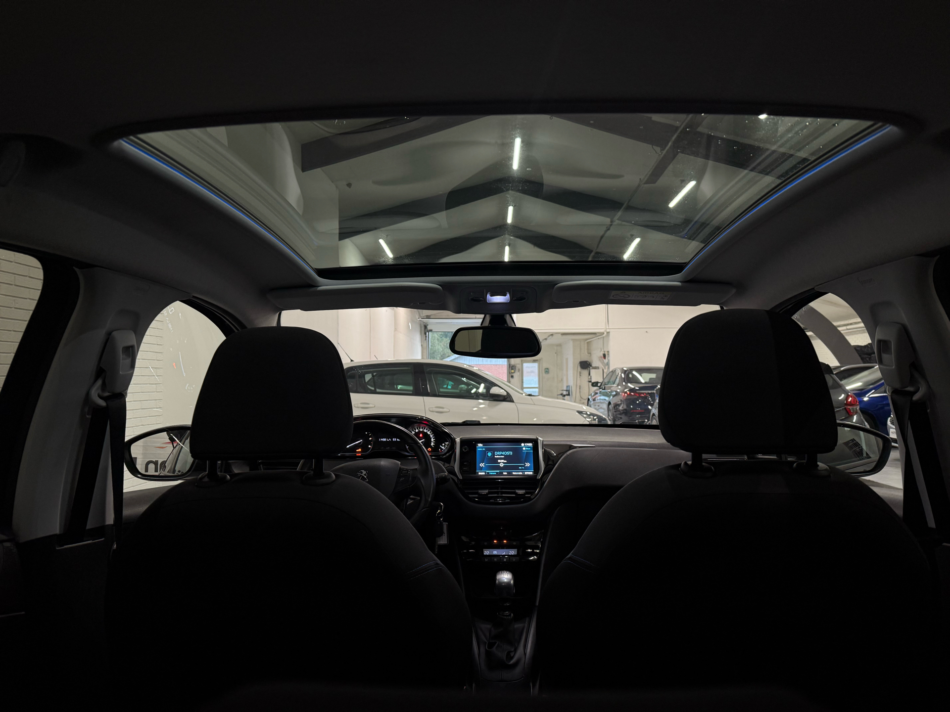 Billede af Peugeot 208 1,5 BlueHDi Signature Sky 100HK 5d