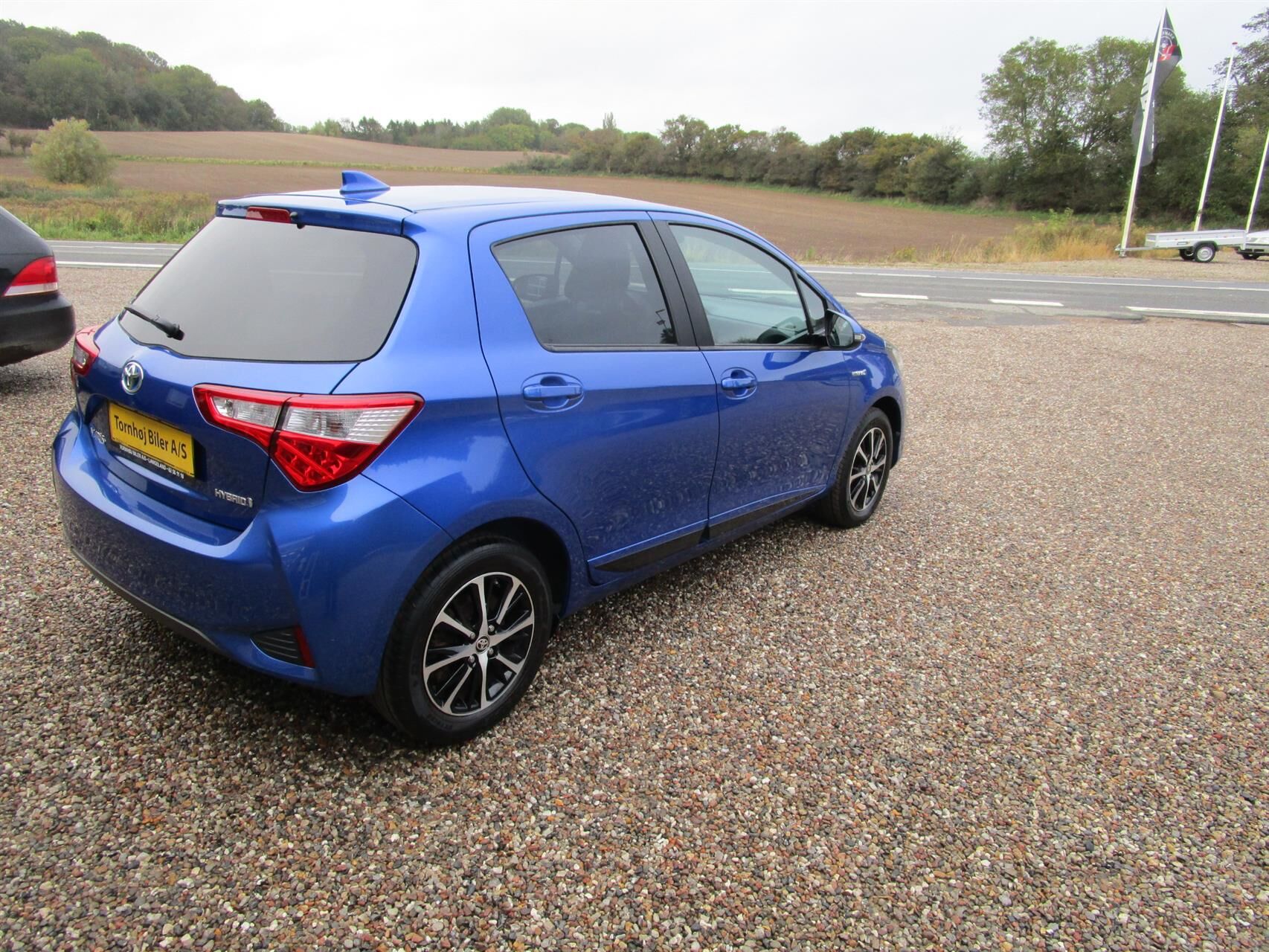 Billede af Toyota Yaris 1,5 Hybrid H2 Limited E-CVT 100HK 5d Trinl. Gear
