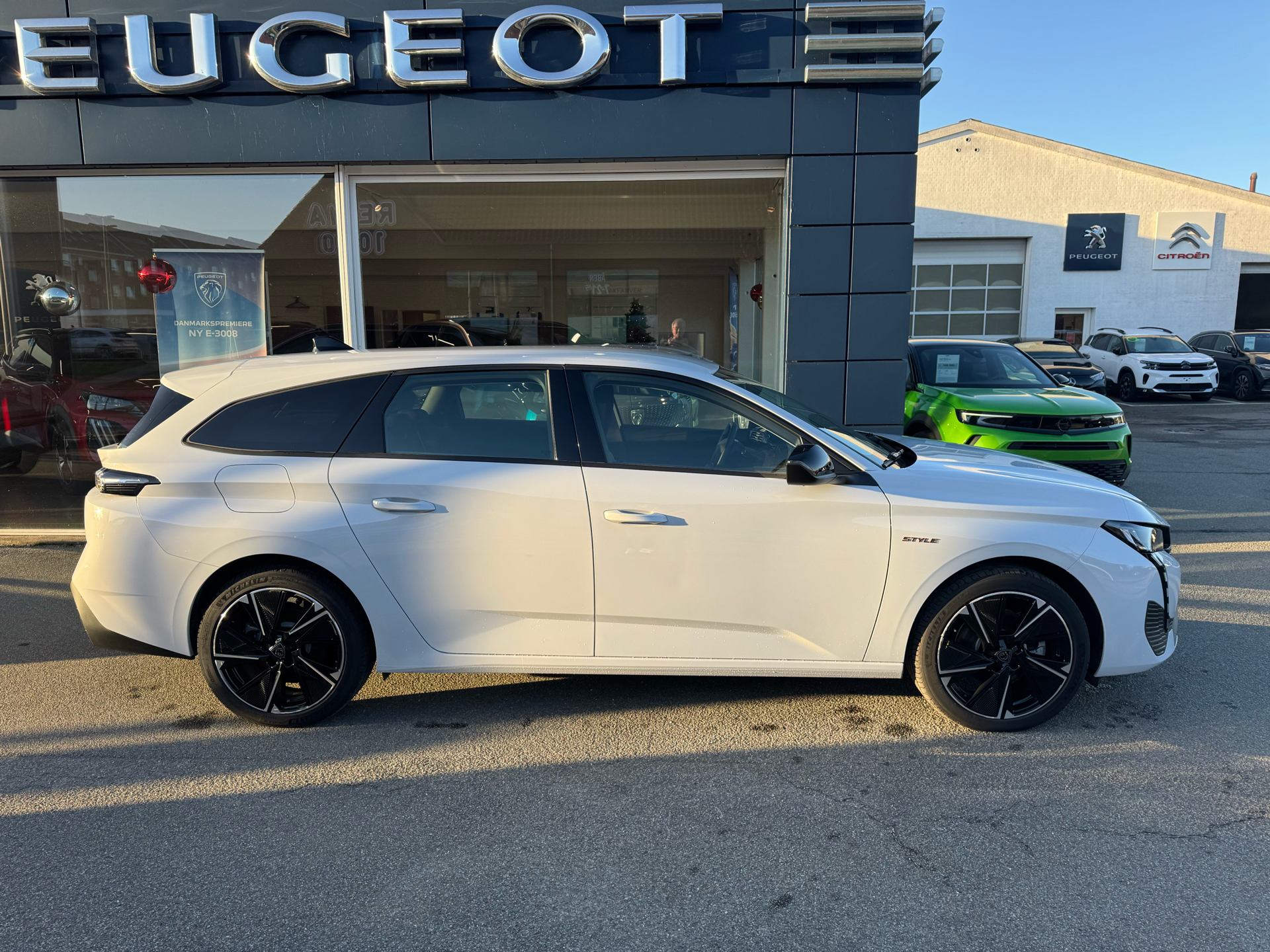 Billede af Peugeot e-308 SW EL Style 156HK Stc Aut.
