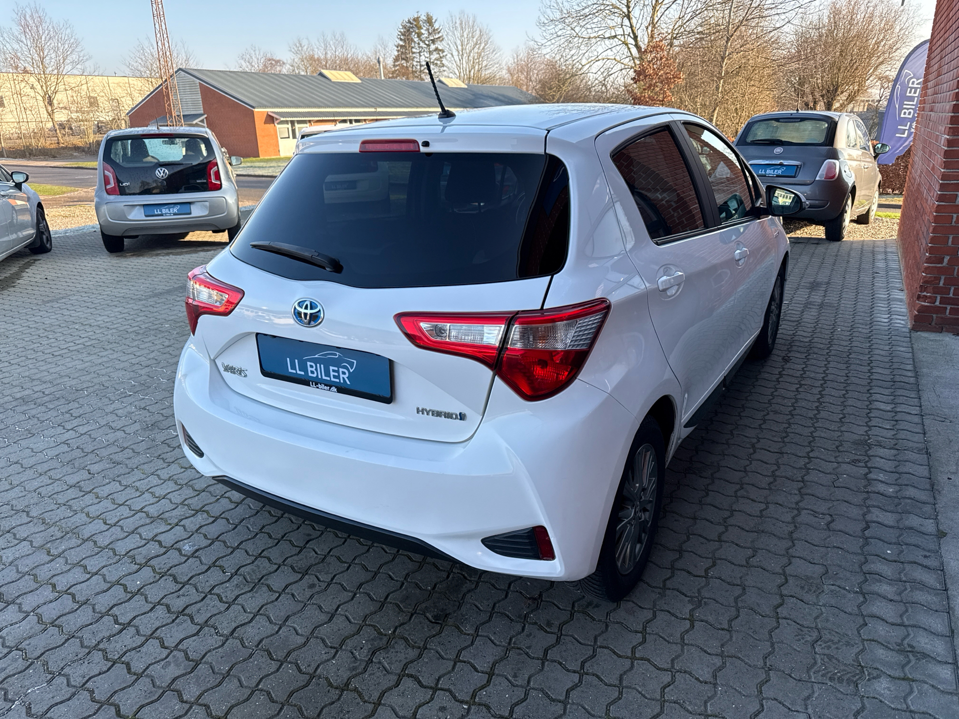 Billede af Toyota Yaris 1,5 Hybrid H2 Premium E-CVT 100HK 5d Trinl. Gear