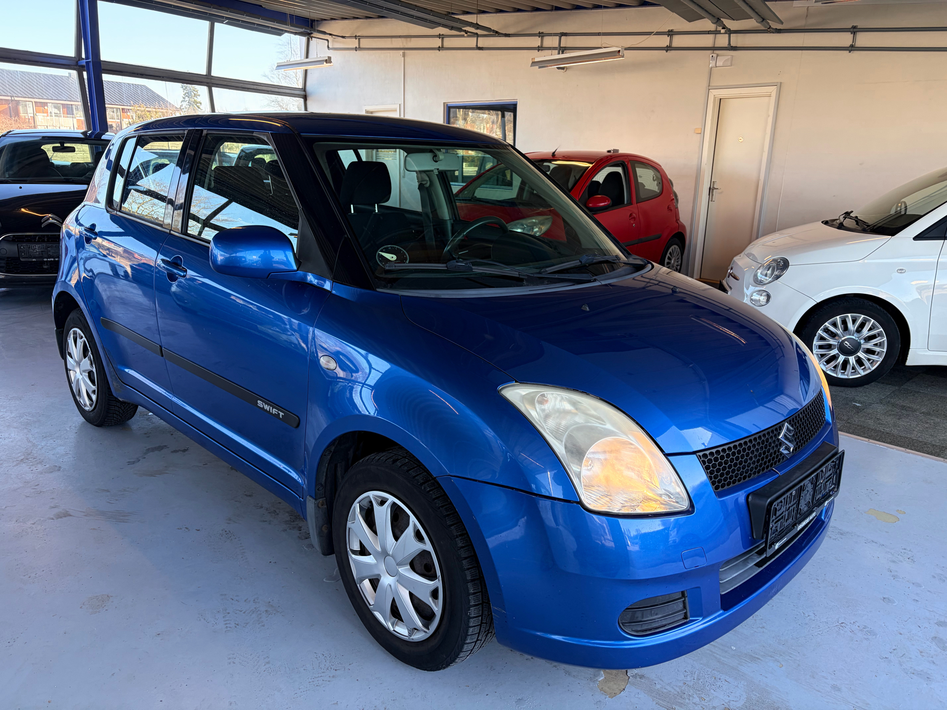 Billede af Suzuki Swift 1,3 GL 4x4 92HK 5d