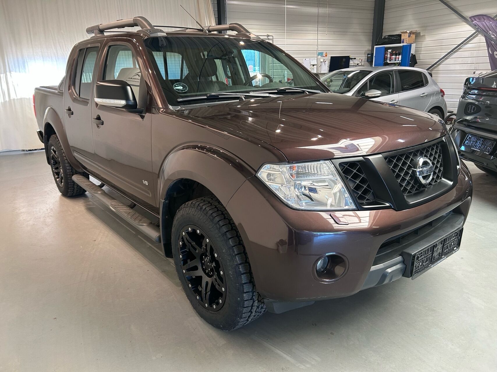 Billede af Nissan Navara Dob. Cab 3,0 V6 DCi LE 4x4 231HK Ladv./Chas. 7g Aut.