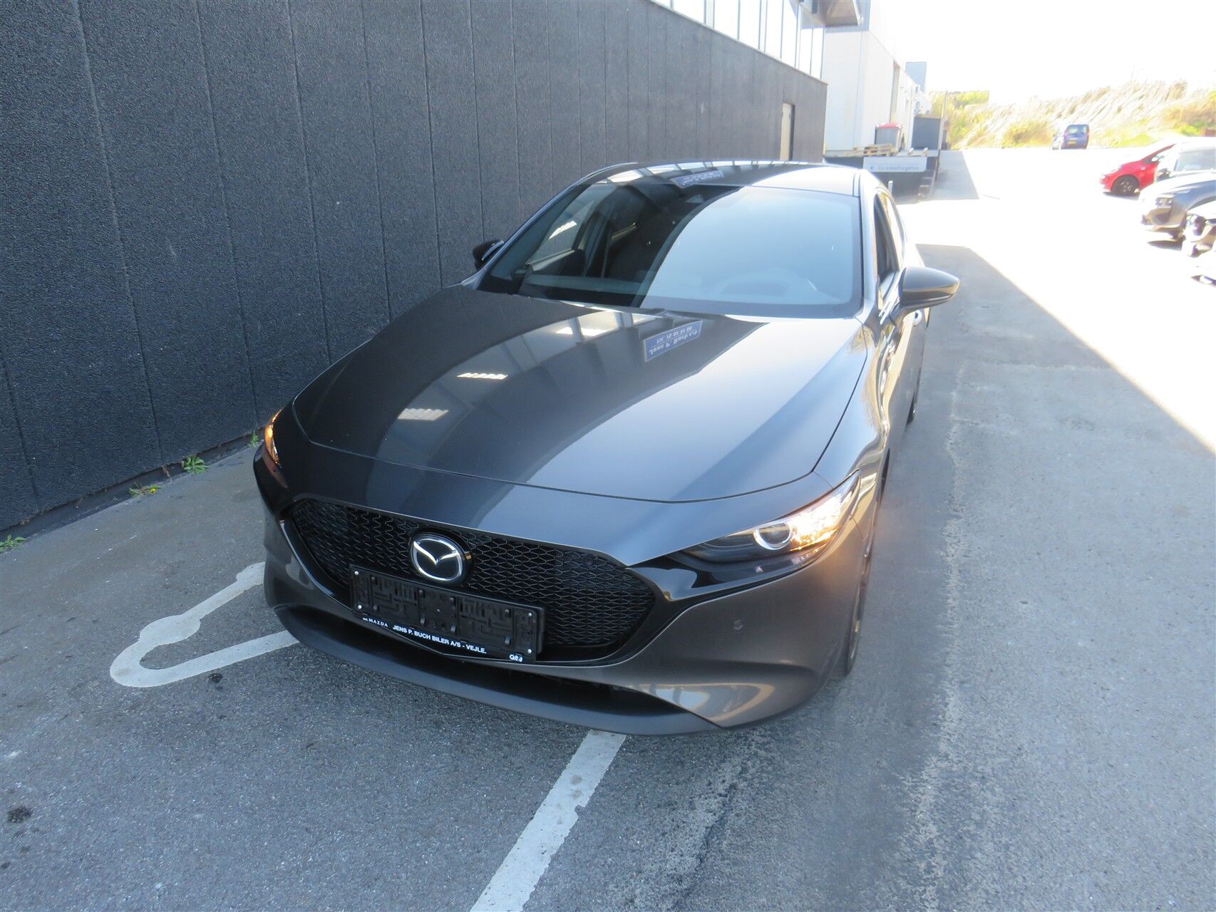 Billede af Mazda 3 2,0 Skyactiv-G  Mild hybrid Homura 150HK 5d 6g Aut.
