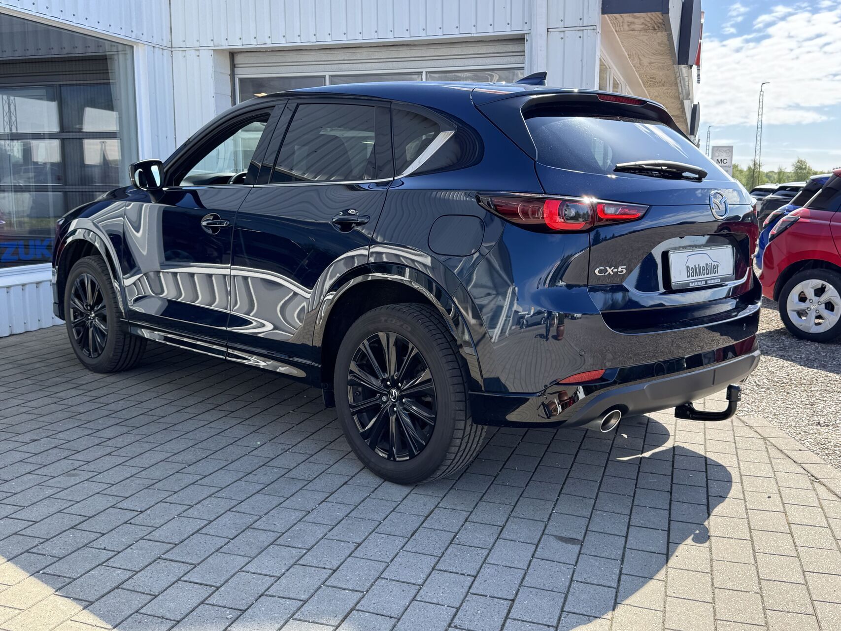 Billede af Mazda CX-5 2,0 e-Skyactiv-G  Mild hybrid Homura 165HK 5d 6g Aut.