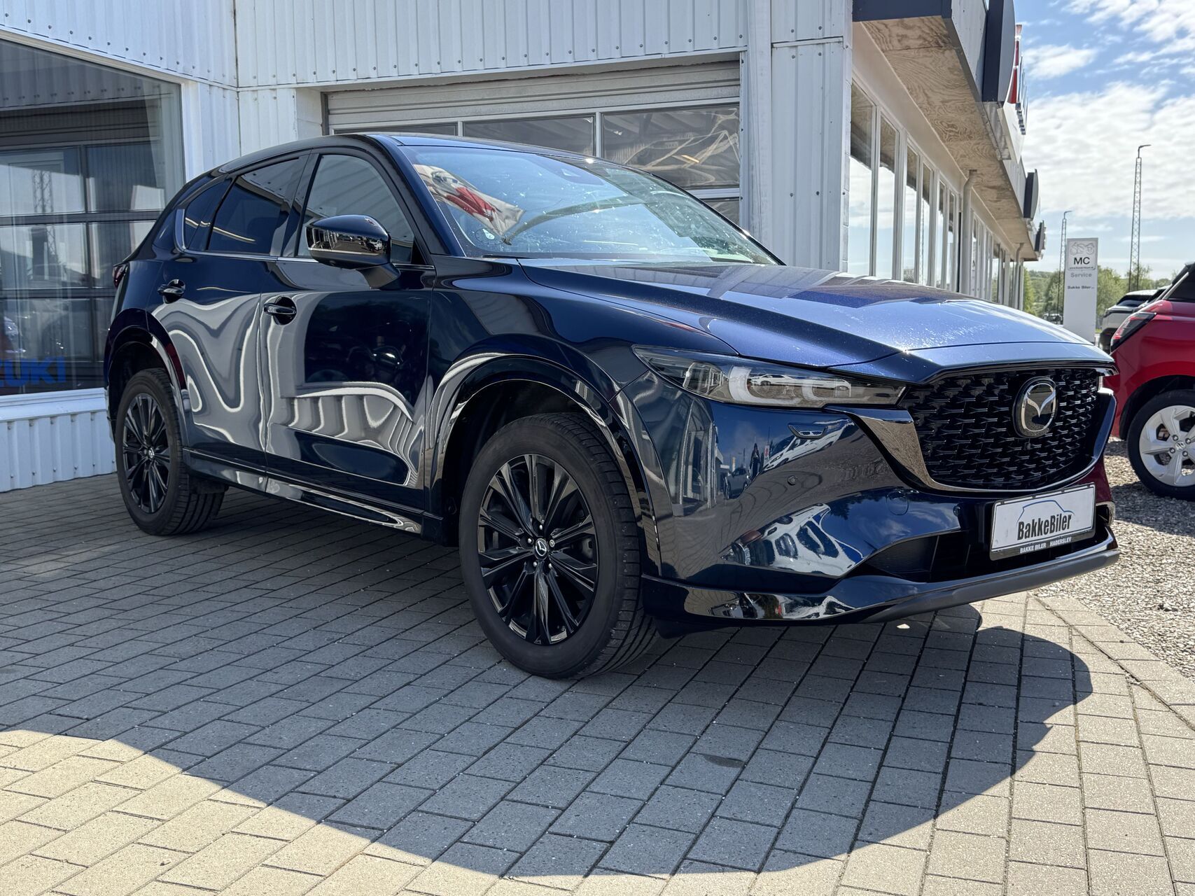 Billede af Mazda CX-5 2,0 e-Skyactiv-G  Mild hybrid Homura 165HK 5d 6g Aut.