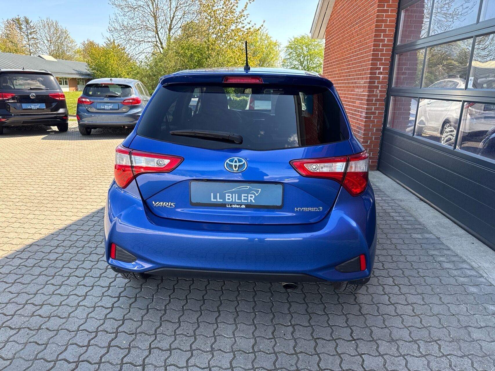 Billede af Toyota Yaris 1,5 Hybrid H2 Exclusive E-CVT 100HK 5d Trinl. Gear