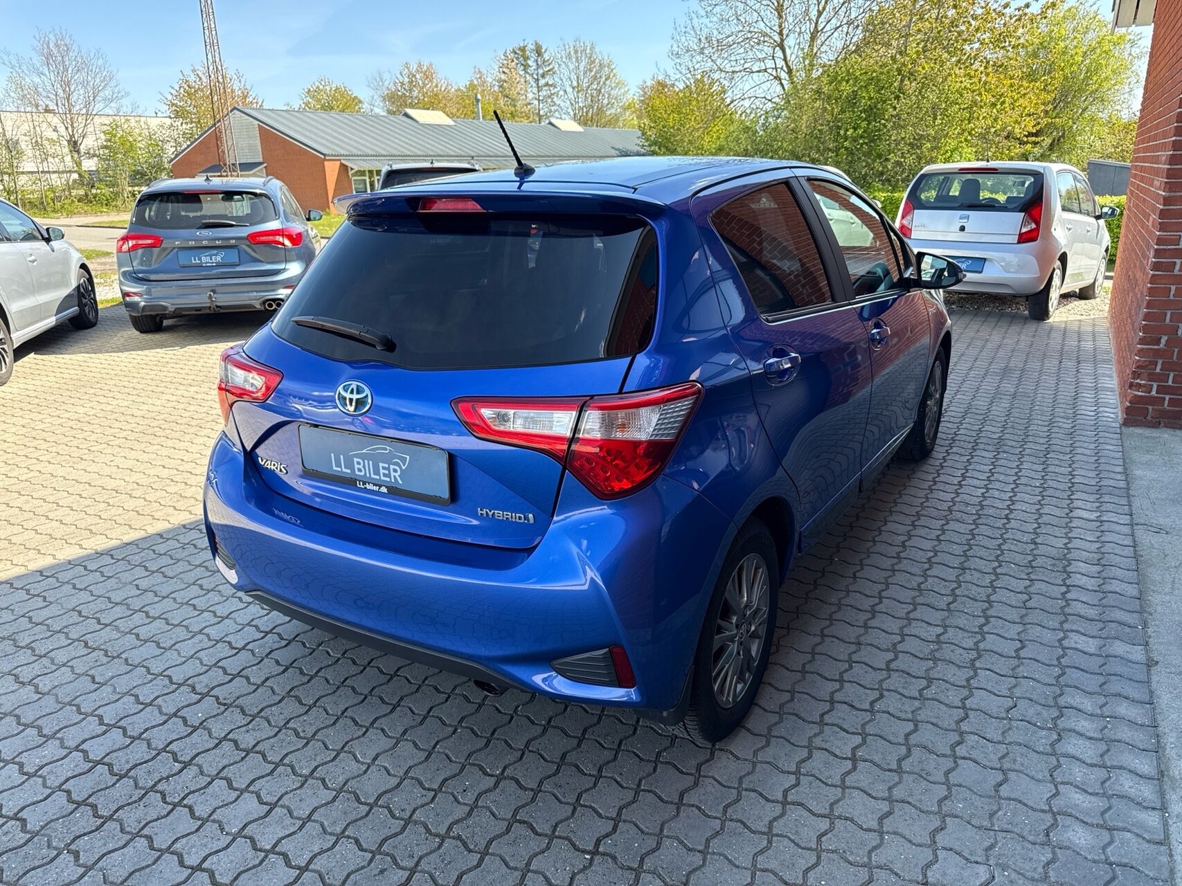 Billede af Toyota Yaris 1,5 Hybrid H2 Exclusive E-CVT 100HK 5d Trinl. Gear