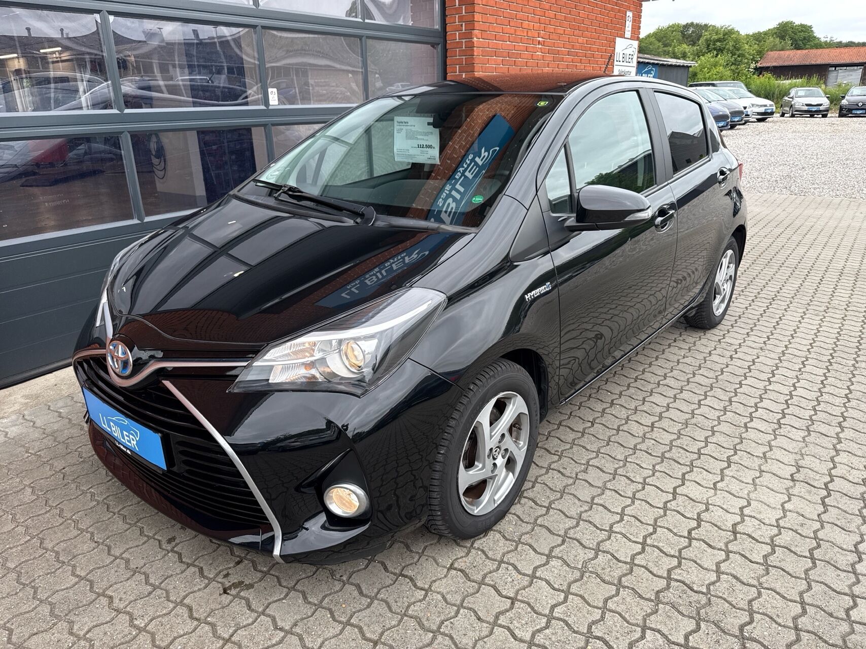 Billede af Toyota Yaris 1,5 Hybrid H2 Premium E-CVT 100HK 5d Trinl. Gear