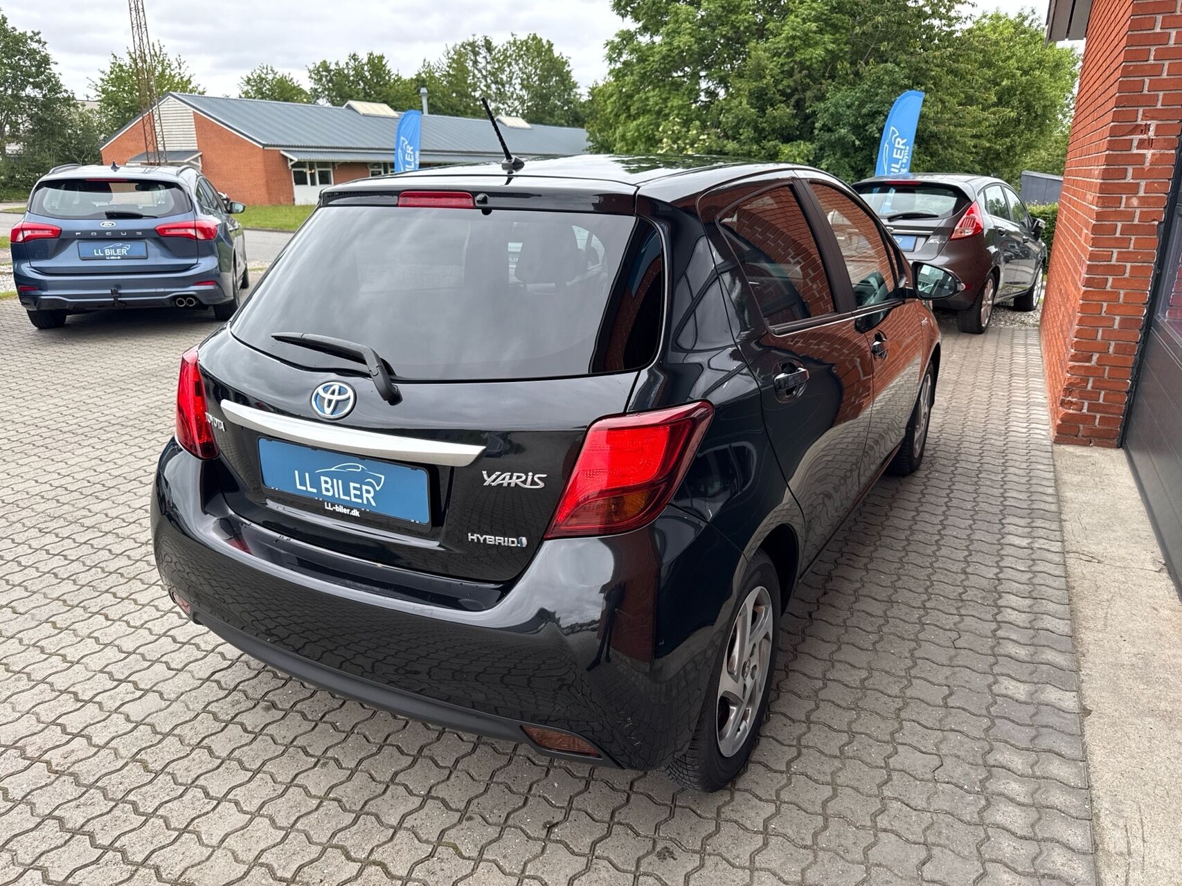Billede af Toyota Yaris 1,5 Hybrid H2 Premium E-CVT 100HK 5d Trinl. Gear