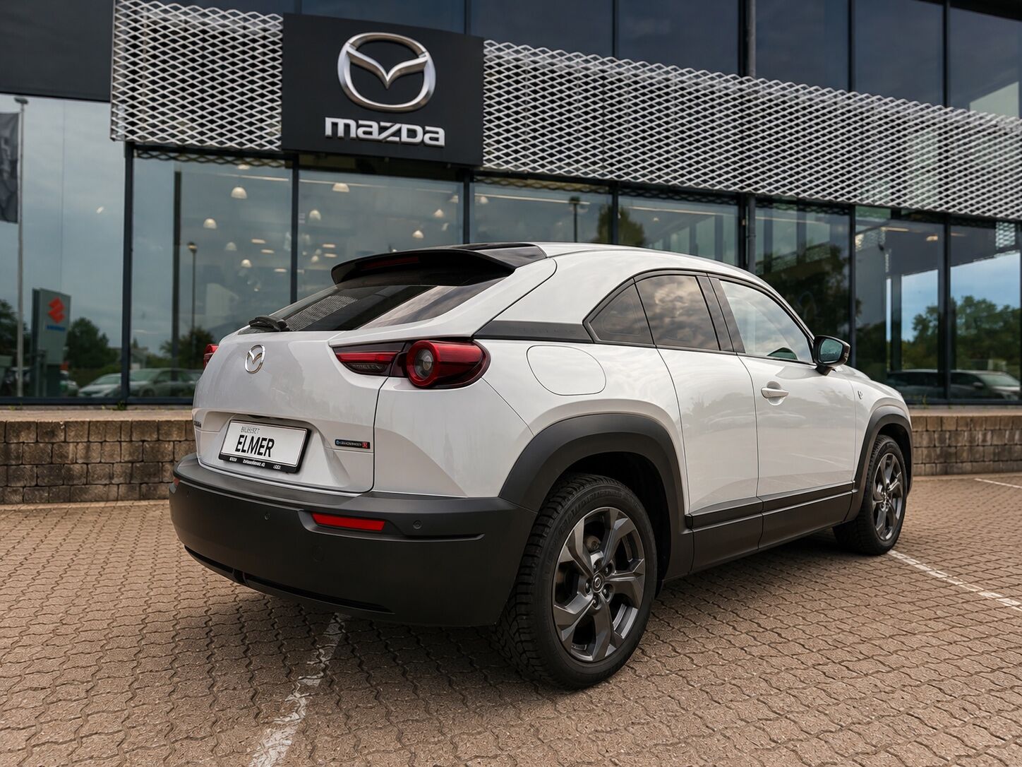 Billede af Mazda MX-30 0,8 e-Skyactiv R-EV  Plugin-hybrid Exclusive-Line 170HK 5d Trinl. Gear