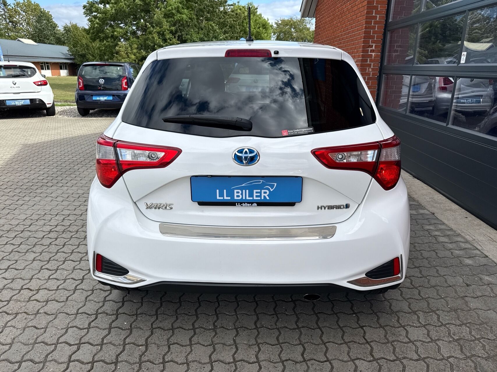 Billede af Toyota Yaris 1,5 Hybrid H2 Premium E-CVT 100HK 5d Trinl. Gear