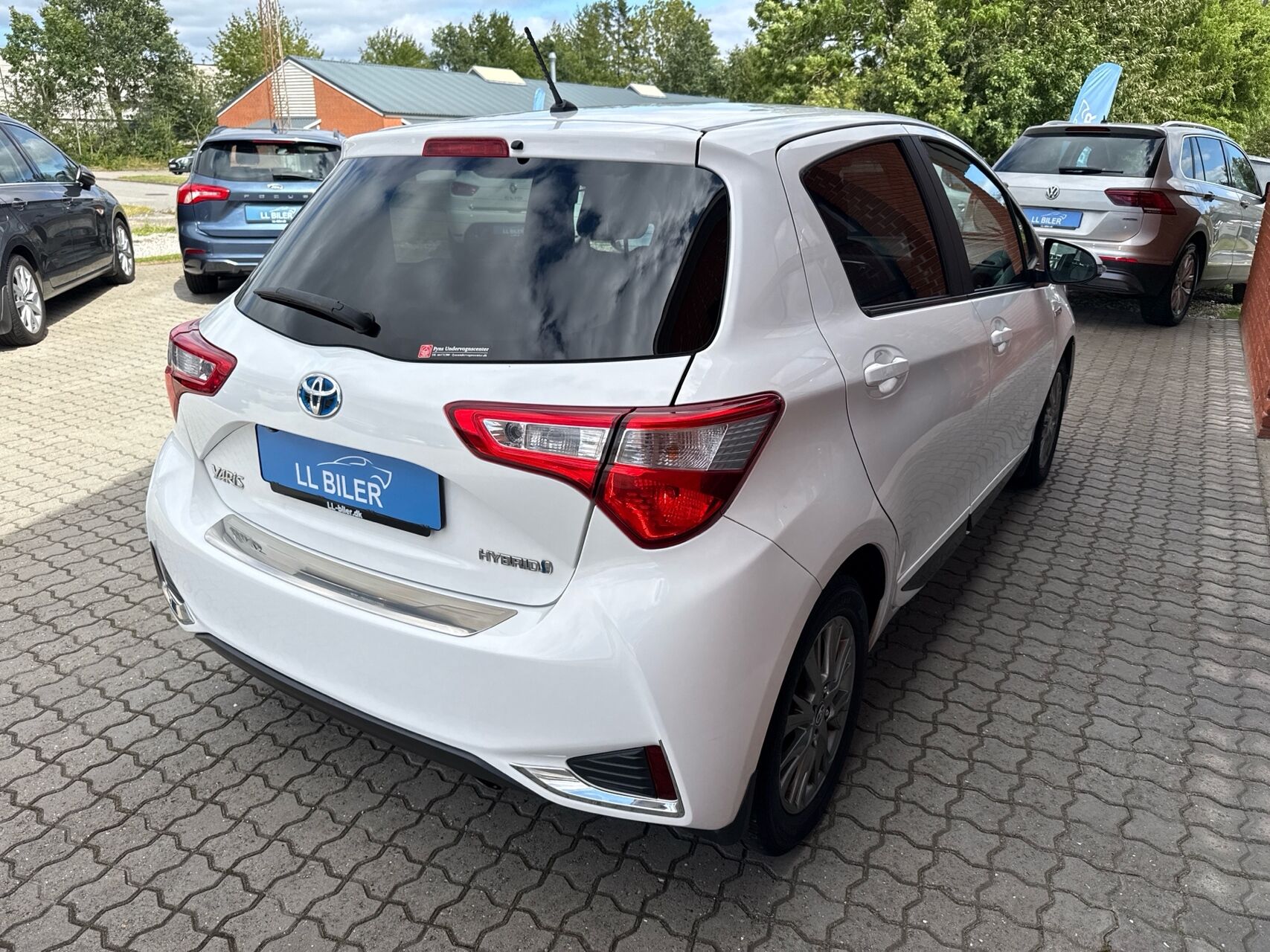 Billede af Toyota Yaris 1,5 Hybrid H2 Premium E-CVT 100HK 5d Trinl. Gear