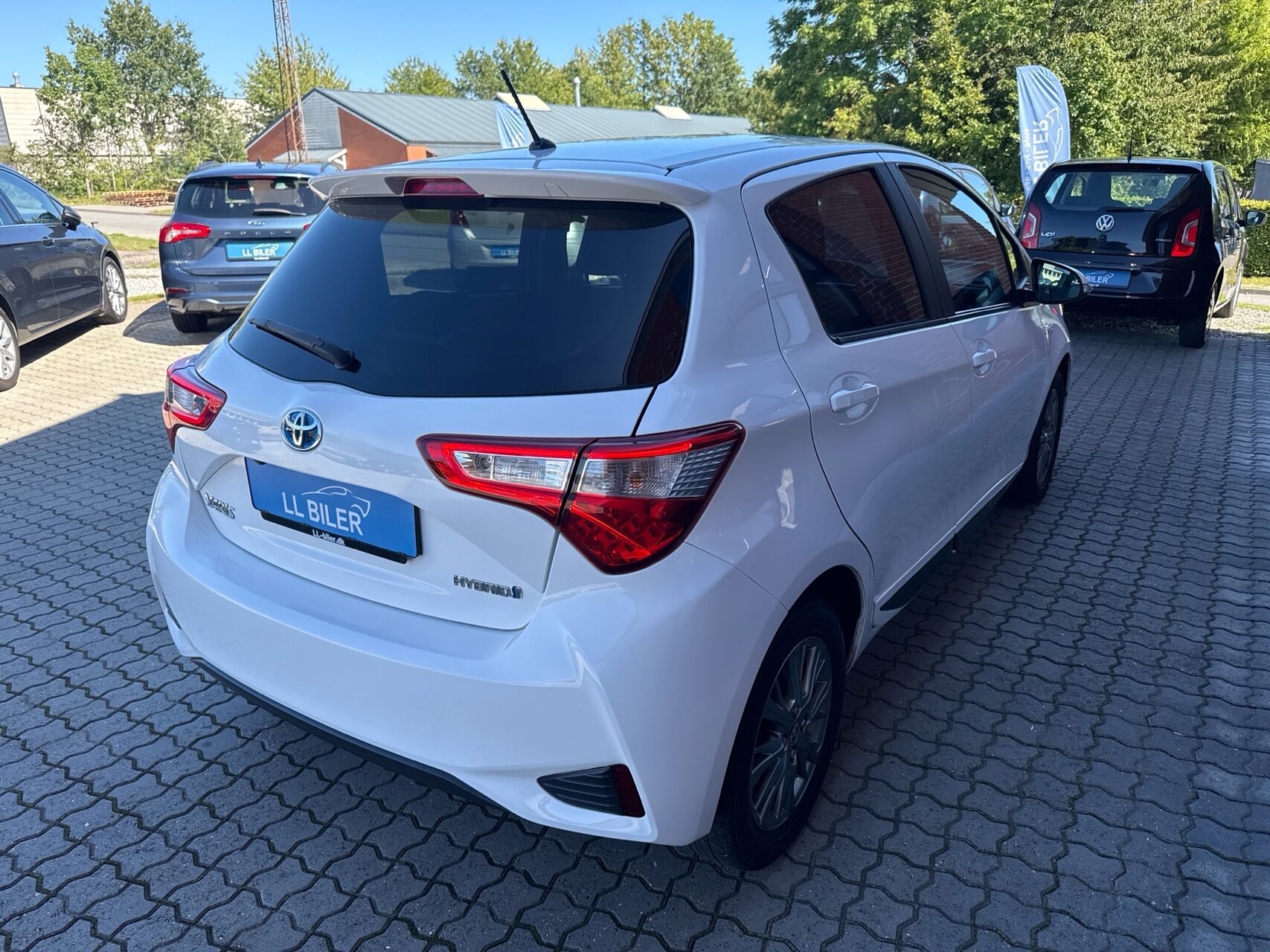 Billede af Toyota Yaris 1,5 Hybrid H2 Exclusive E-CVT 100HK 5d Trinl. Gear