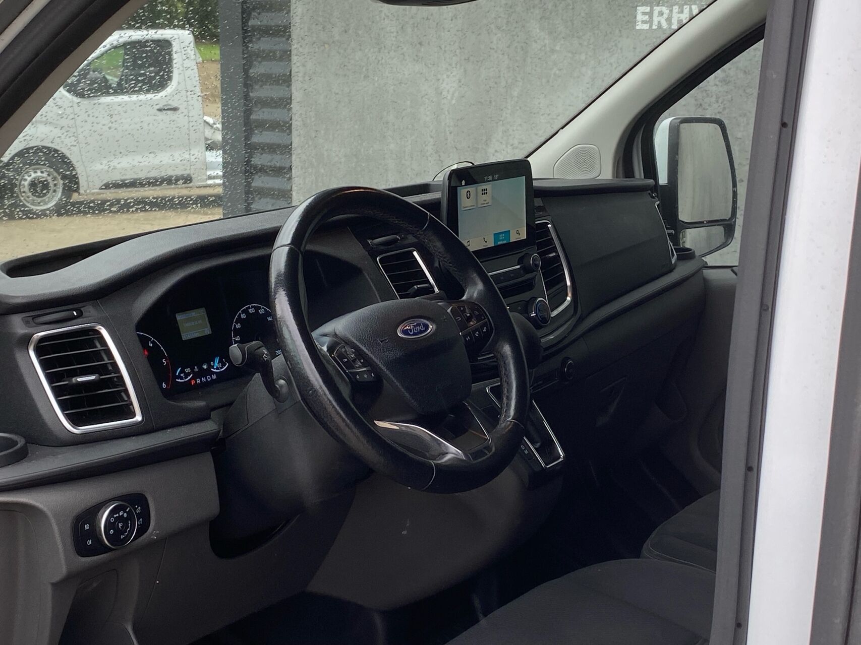 Billede af Ford Transit Custom 300 L2H1 2,0 TDCi Limited 170HK Van 6g Aut.
