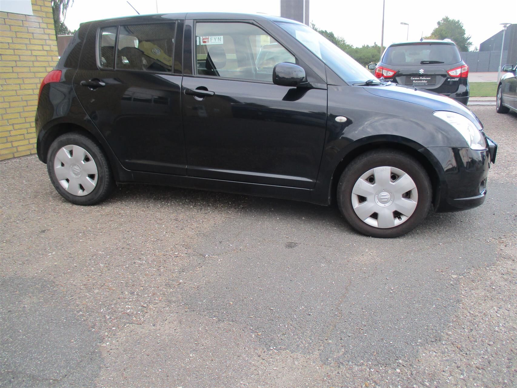 Billede af Suzuki Swift 1,3 GL 4x4 92HK 5d