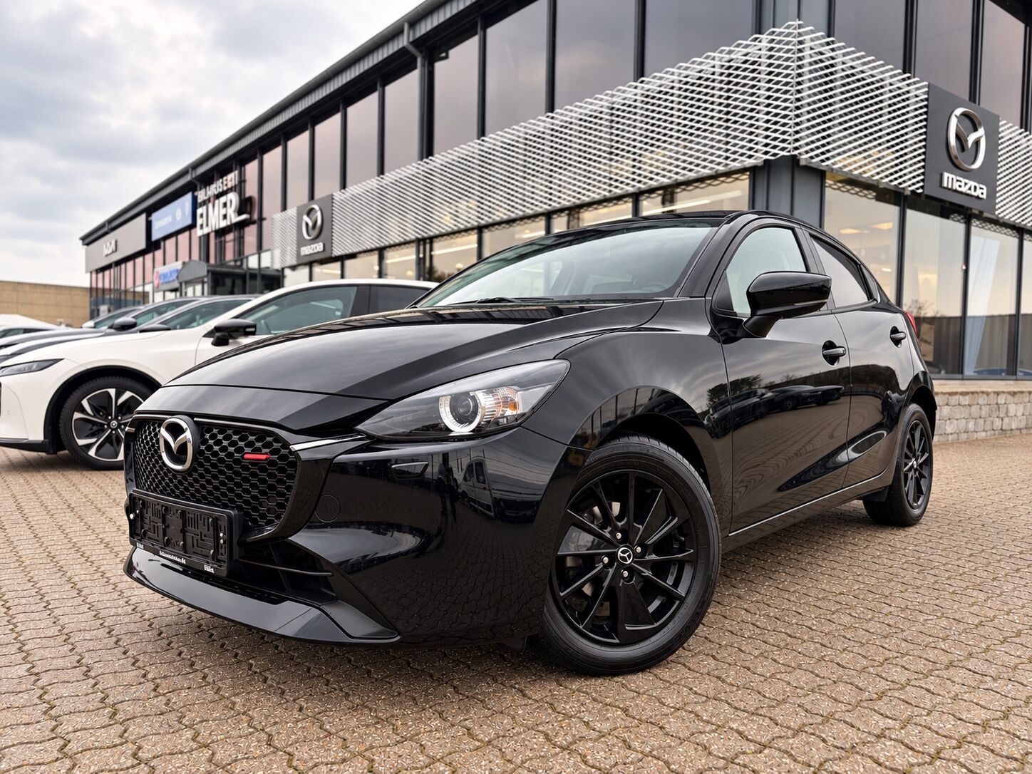 Billede af Mazda 2 1,5 Skyactiv-G Homura 90HK 5d 6g Aut.